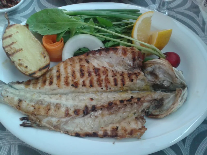 Grilled sea bass with a grilled potato